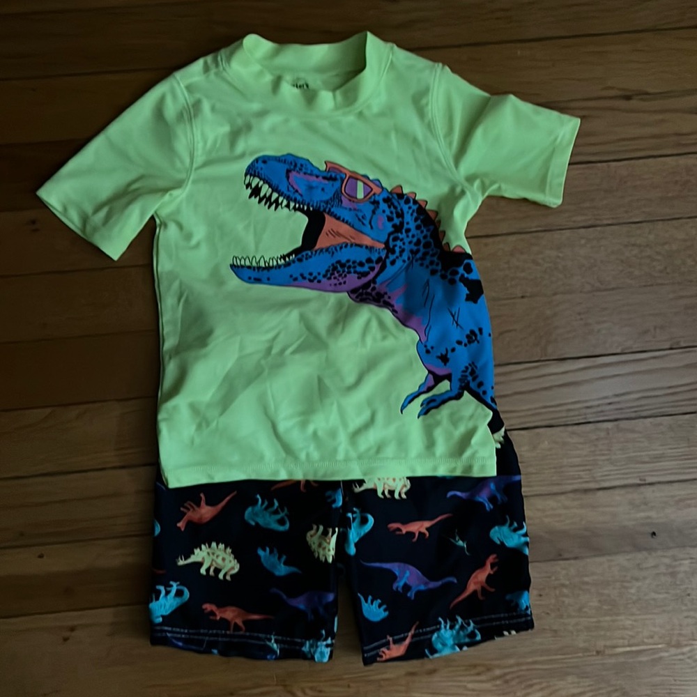Carters boys swimsuit. Dinosaur print. Size 6.
